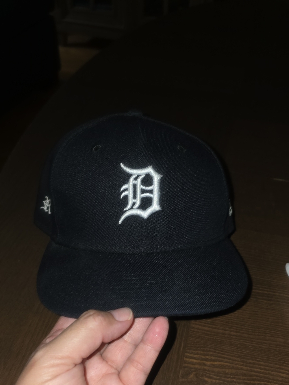 New Era Black Snapback Hat with White Old English D Logo